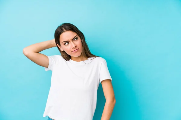 Young Caucasian Woman Isolated Touching Back Head Thinking Making Choice — Stock Photo, Image