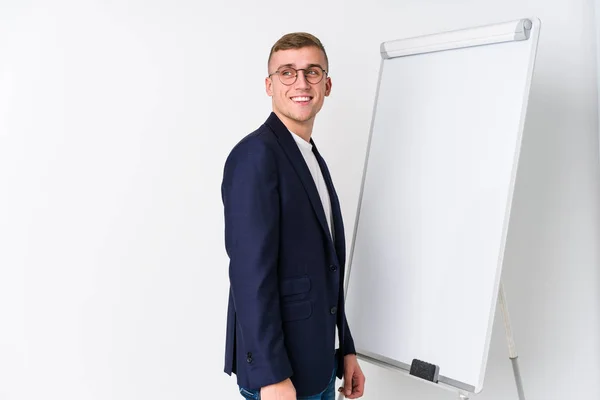 Young Coaching Man Showing White Board Looks Aside Smiling Cheerful — Stock Photo, Image