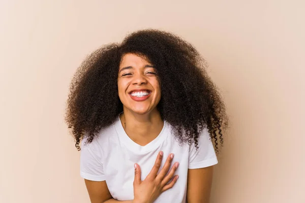 Young African American Woman Laughs Happily Has Fun Keeping Hands — Stock Photo, Image