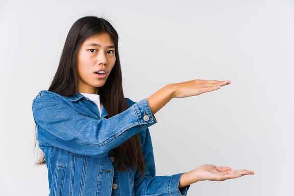 Young Asian Woman Shocked Amazed Holding Copy Space Hands — 스톡 사진