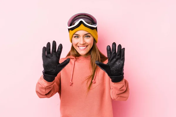 Young Caucasian Woman Wearing Ski Clothes Isolated Showing Number Ten — 스톡 사진