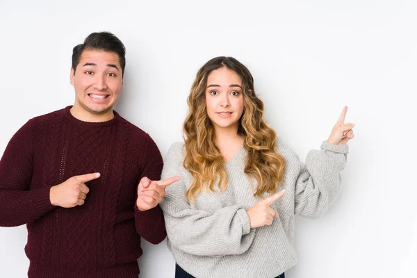 Young Couple Posing White Background Shocked Pointing Index Fingers Copy — 스톡 사진