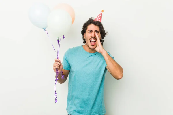 Young Man Celebrating Party Holding Balloons Shouting Excited Front — Stock Photo, Image