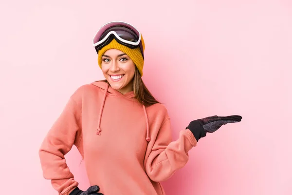 Young Caucasian Woman Wearing Ski Clothes Isolated Showing Copy Space — 스톡 사진