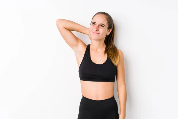 Jonge Blanke Fitness Vrouw Poseren Een Witte Achtergrond Lijden Nek — Stockfoto