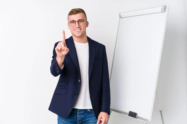 Young Coaching Man Showing White Board Showing Number One Finger — Stock Photo, Image