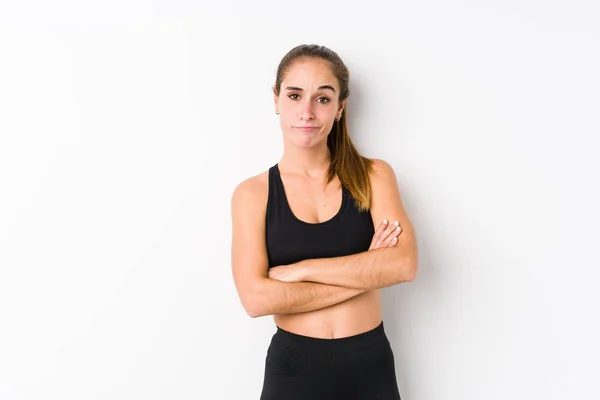 Young Caucasian Fitness Woman Posing White Background Unhappy Looking Camera — Stock Photo, Image