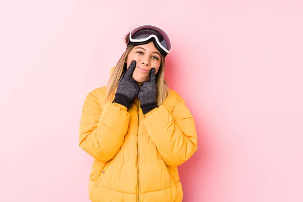 Young Caucasian Woman Wearing Ski Clothes Pink Background Doubting Two — 스톡 사진