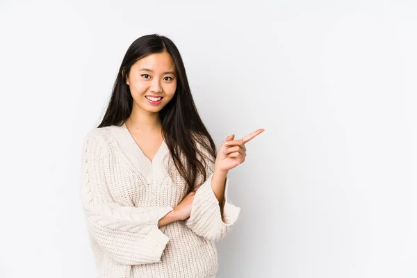 Young Chinese Woman Isolated Smiling Cheerfully Pointing Forefinger Away — Stock Photo, Image