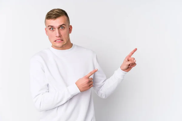 Young Caucasian Man White Background Shocked Pointing Index Fingers Copy — ストック写真
