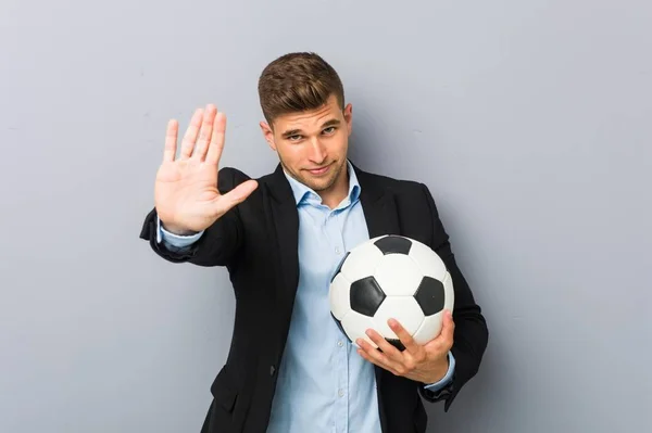 Young Soccer Trainer Standing Outstretched Hand Showing Stop Sign Preventing — 스톡 사진