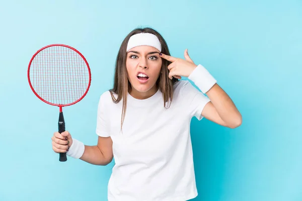 Jovem Caucasic Mulher Jogar Badminton Isolado Mostrando Gesto Decepção Com — Fotografia de Stock
