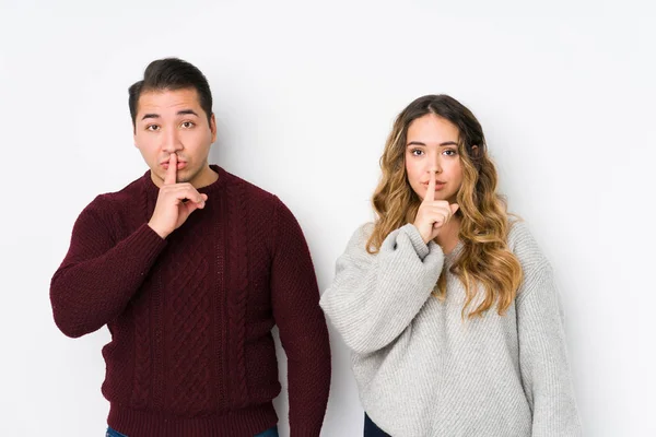 Young Couple Posing White Background Keeping Secret Asking Silence — 스톡 사진