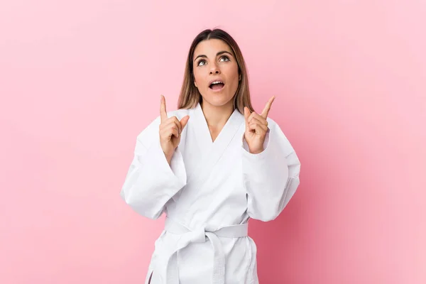 Young Karate Woman Pointing Upside Opened Mouth — 스톡 사진