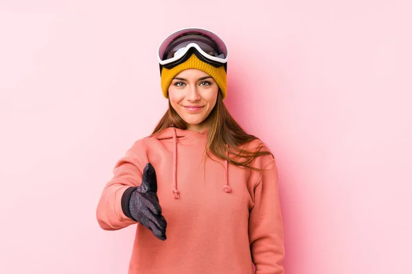 Young Caucasian Woman Wearing Ski Clothes Isolated Stretching Hand Camera — 스톡 사진