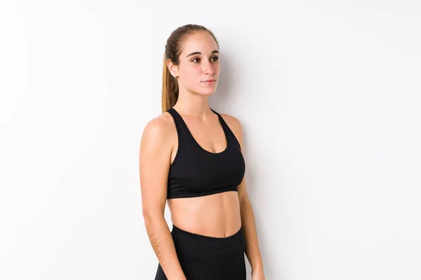 Young Caucasian Fitness Woman Posing White Background Gazing Left Sideways — Stok fotoğraf