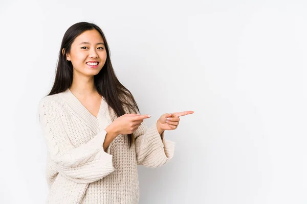 Young Chinese Woman Isolated Excited Pointing Forefingers Away — 스톡 사진