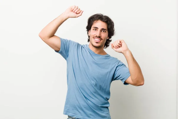 Young Handsome Man White Background Celebrating Special Day Jumps Raise — ストック写真