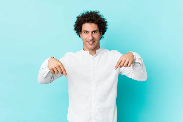Young Curly Mature Man Wearing Elegant Shirt Points Fingers Positive — 스톡 사진