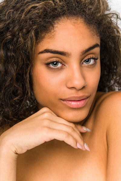 Young african american woman face closeup