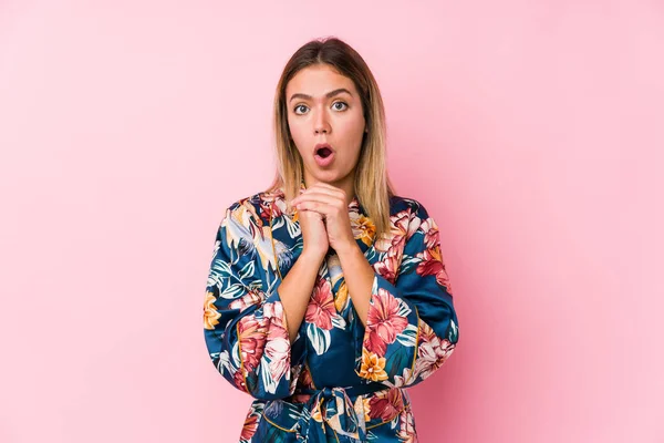 Young Caucasian Woman Wearing Pajamas Praying Luck Amazed Opening Mouth — Stock Photo, Image