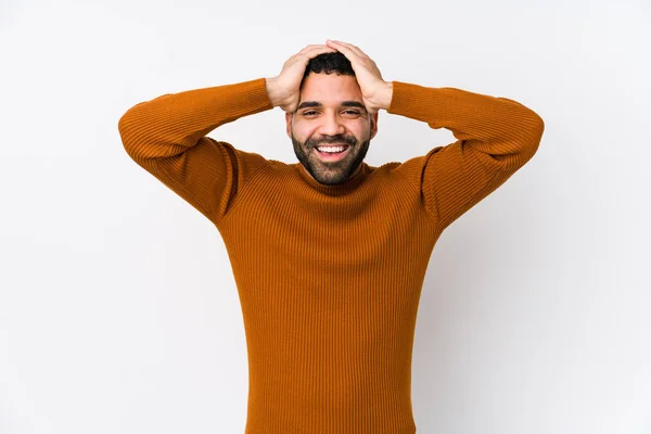 Young Latin Man White Background Isolated Laughs Joyfully Keeping Hands — Stock Photo, Image