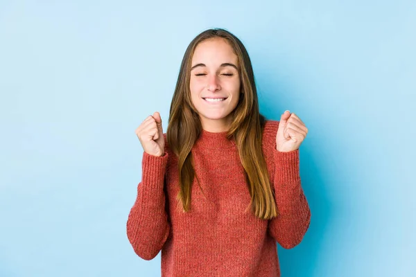 Young Caucasian Woman Posing Isolated Raising Fist Feeling Happy Successful — Stock Photo, Image