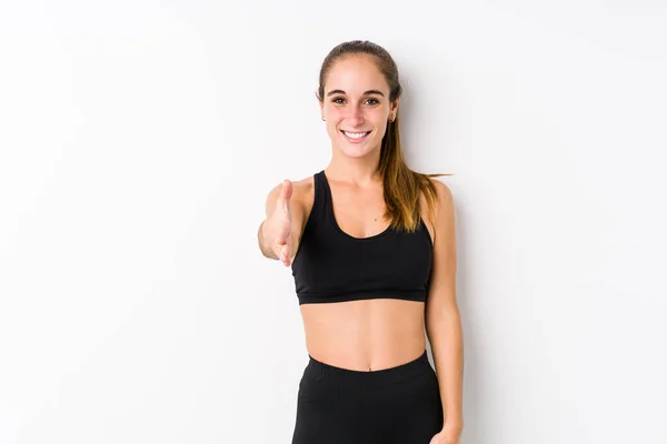 Jonge Kaukasische Fitness Vrouw Poseren Een Witte Achtergrond Stretching Hand — Stockfoto