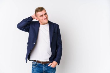 Genç iş beyaz adam kafa geri dokunmadan, düşünme ve bir seçim yapma.