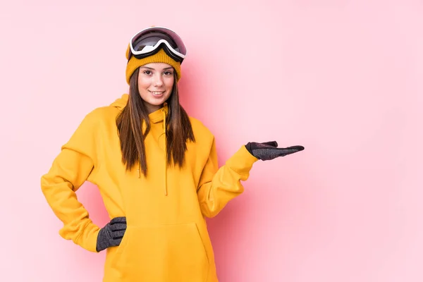 Young Caucasian Skier Woman Isolated Showing Copy Space Palm Holding — Stock Photo, Image