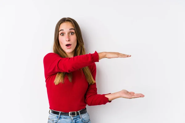 Young Caucasian Woman Posing Isolated Shocked Amazed Holding Copy Space — Stock Photo, Image