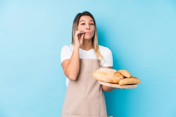 Young Caucasian Baker Woman Isolated Fingers Lips Keeping Secret — 스톡 사진