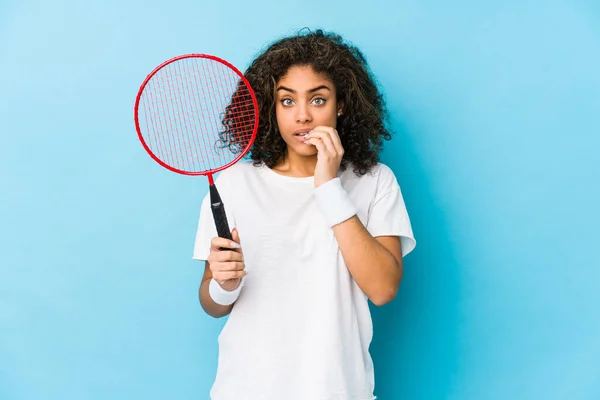 Young African American Woman Playing Badminton Biting Fingernails Nervous Very — ストック写真