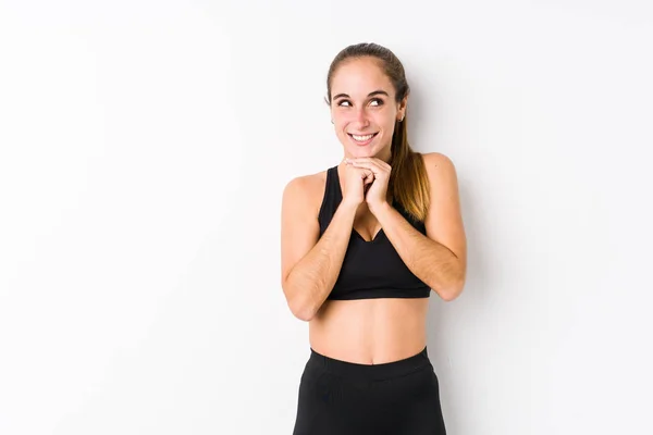 Young Caucasian Fitness Woman Posing White Background Keeps Hands Chin — 스톡 사진