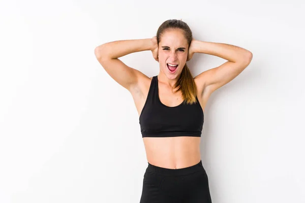Young Caucasian Fitness Woman Posing White Background Covering Ears Hands — Stock Photo, Image