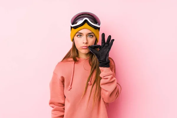Young Caucasian Woman Wearing Ski Clothes Isolated Fingers Lips Keeping — 스톡 사진