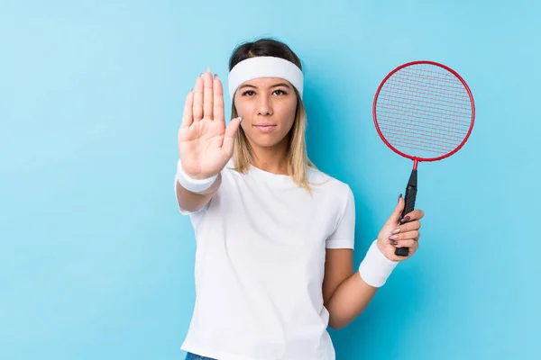 Young Caucasian Woman Playing Badminton Isolated Standing Outstretched Hand Showing — Stock Photo, Image