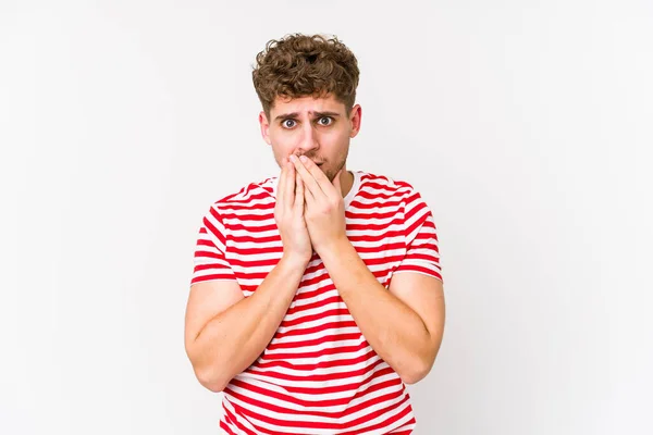 Young Blond Curly Hair Caucasian Man Isolated Covering Mouth Hands — Stock Photo, Image