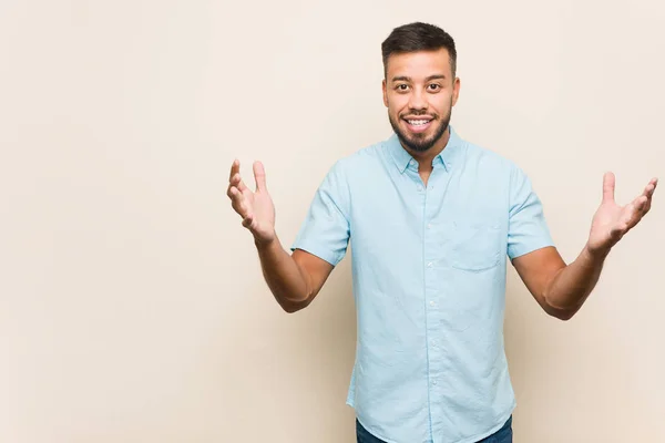 Young South Asian Man Receiving Pleasant Surprise Excited Raising Hands — Stock Photo, Image