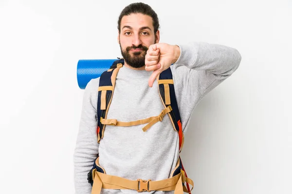 Ung Backpacker Man Isolerad Vit Bakgrund Visar Motbjudande Gest Tummen — Stockfoto