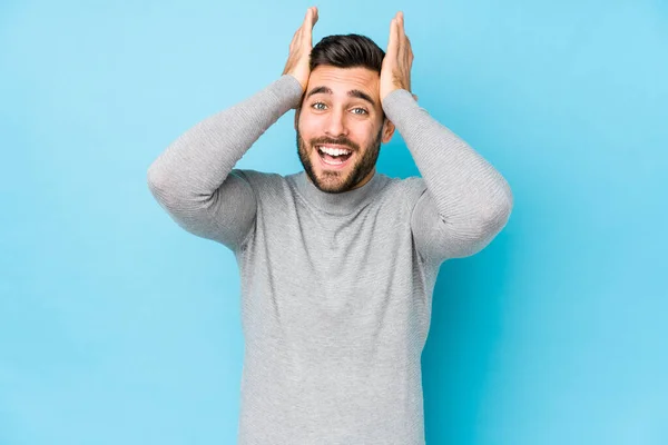 Young Caucasian Man Blue Background Isolated Laughs Joyfully Keeping Hands — ストック写真