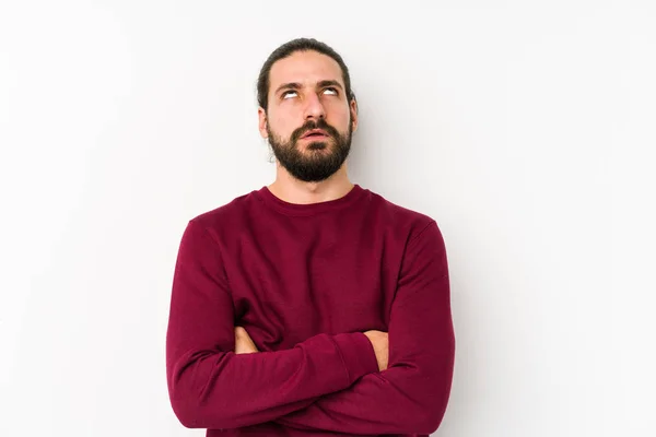 Jovem Homem Cabelo Longo Isolado Fundo Branco Cansado Uma Tarefa — Fotografia de Stock