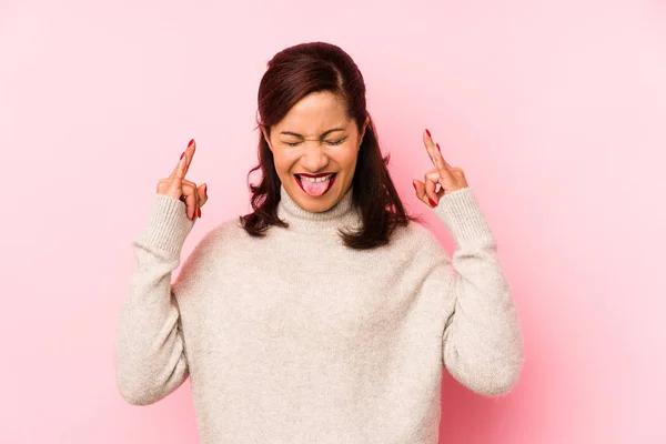 Middle Age Latin Woman Isolated Pink Background Showing Rock Gesture — Stock Photo, Image