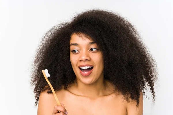 Young Afro Woman Holding Teeth Brush Isolated Impressed Holding Copy — Stock Photo, Image