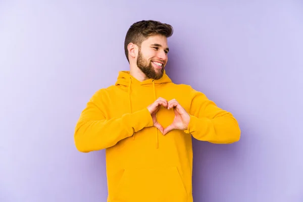 Young Man Isolated Purple Background Smiling Showing Heart Shape Hands — Stock Photo, Image