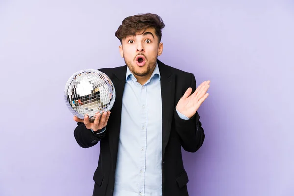 Young Arabian Man Holding Party Ball Isolated Surprised Shocked — Stock Photo, Image