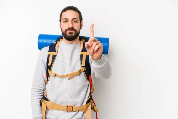 Ung Backpacker Man Isolerad Vit Bakgrund Visar Nummer Ett Med — Stockfoto