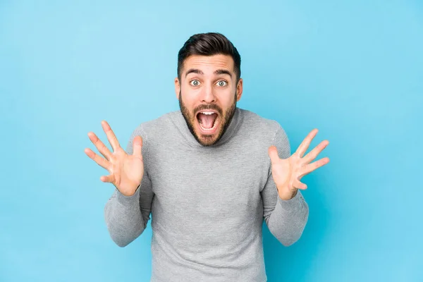 Young Caucasian Man Blue Background Isolated Celebrating Victory Success Surprised — Stock Photo, Image