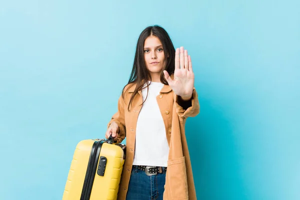 Young Caucasian Woman Holding Suitcase Standing Outstretched Hand Showing Stop — Stock Photo, Image