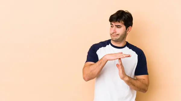 Young Man Isolated Beige Background Showing Timeout Gesture — Stock Photo, Image
